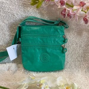Kipling three pocket crossbody purse